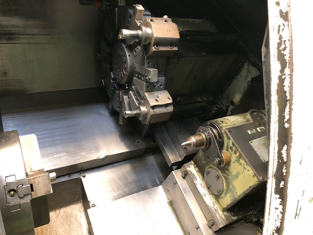 DOOSAN S310 CNC Lathe with Swarf Conveyor. Fanuc 21-iT Control.